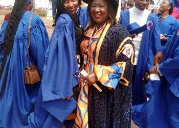 Prof. Florence Obi, Vice Chancellor of the University of Calabar (Right), with a newly admitted student during the 46th matriculation at the Abraham Ordia Stadium on Friday, 26 January 2024.