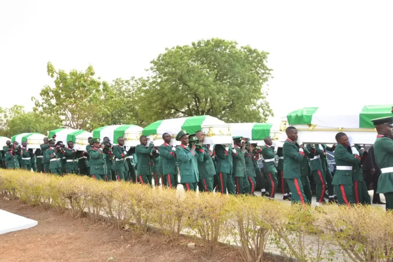 Slain 17 soldiers buried amidst tears in Abuja