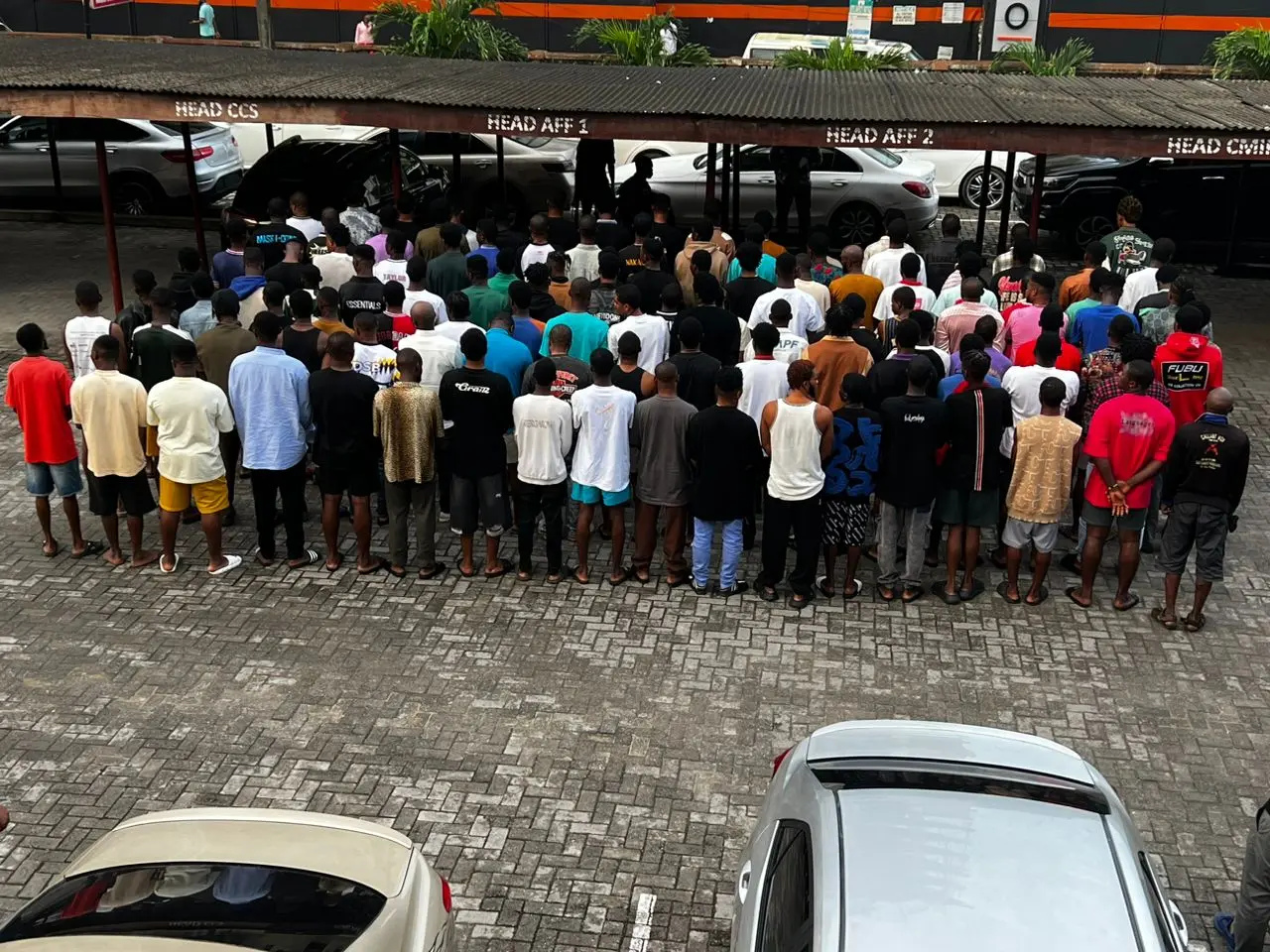 EFCC parades 117 arrested at Regional Hotel despite ordering arrest of Officers involved in unprofessional conduct