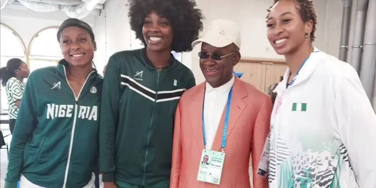 Senator John Owan-Enoh (2nd Right) with D'Tigress Basketball team players