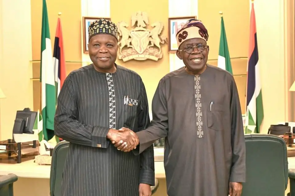 Bola Tinubu in handshake with Governor Inuwa Yahaya