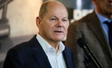 Scholz, at struggling Ford plant, urges EU electric vehicle subsidies