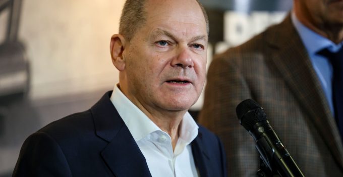 Scholz, at struggling Ford plant, urges EU electric vehicle subsidies