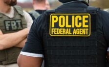 Viral Image: FBI Agent Reportedly Aims ‘Loaded Gun’ at Baby During January 6 Raid