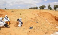 28 Migrants Discovered Dead in Mass Grave in Libya