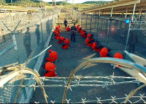 Pentagon Reports Detention of 10 “High-Threat” Migrants at Guantanamo Bay