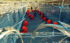 Pentagon Reports Detention of 10 "High-Threat" Migrants at Guantanamo Bay