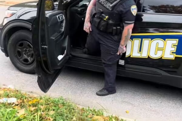 Baltimore police suspend officer for trying to run over civilian