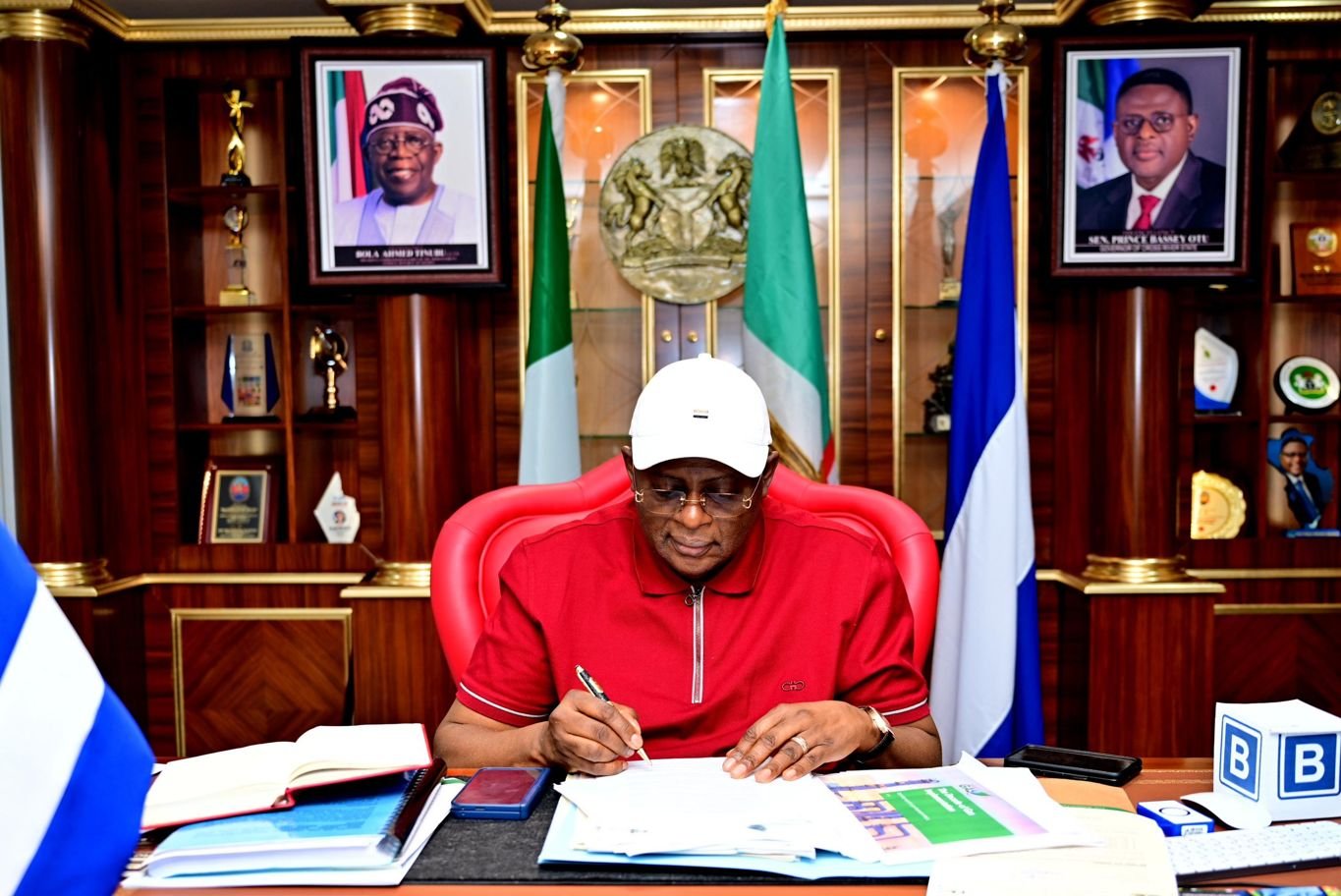 bassey otu signing 2 Gov Otu appoints 5 into Cross River State Sports Commission