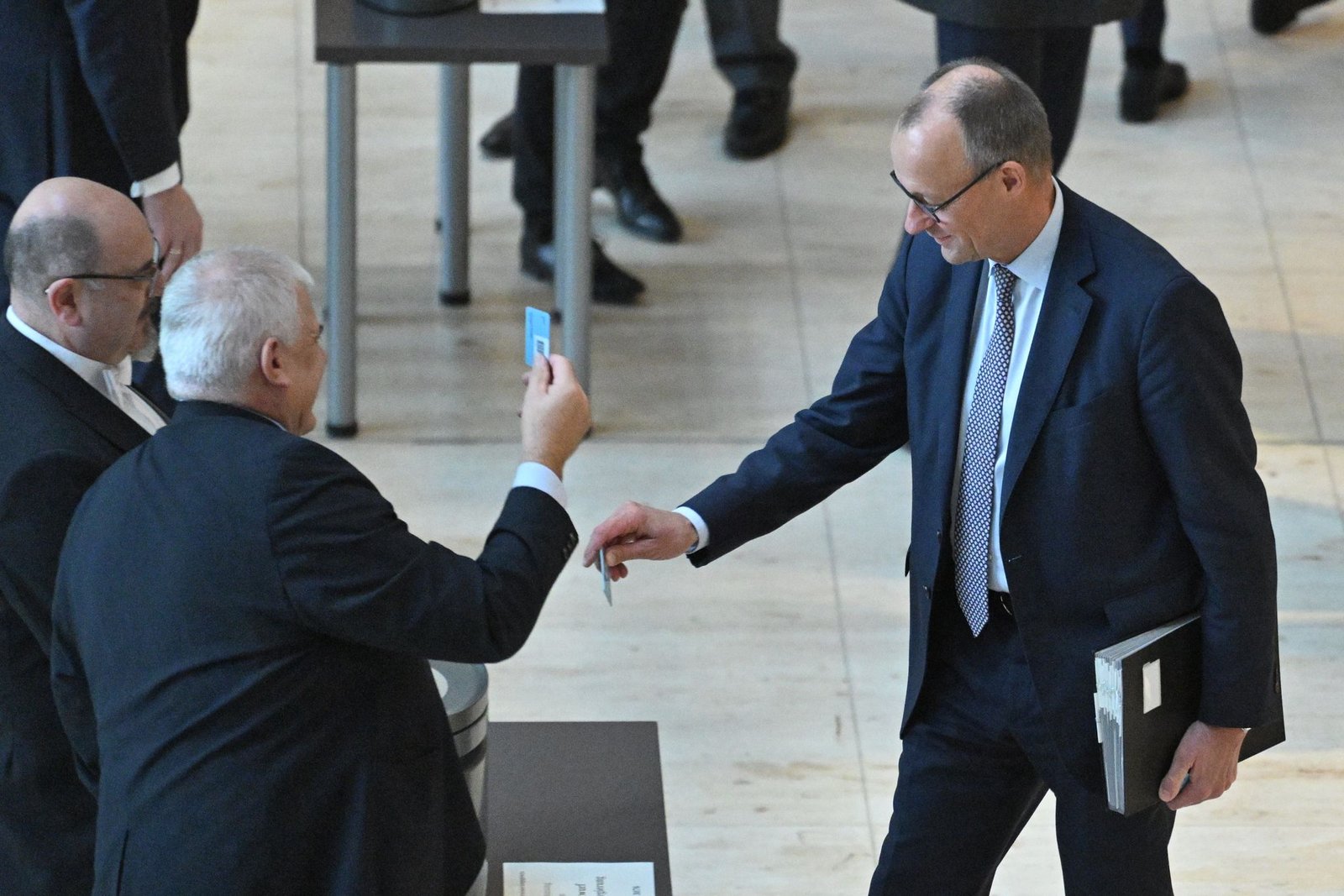 Chancellor Friedrich Merz voting German lower house passes new voluntary military service