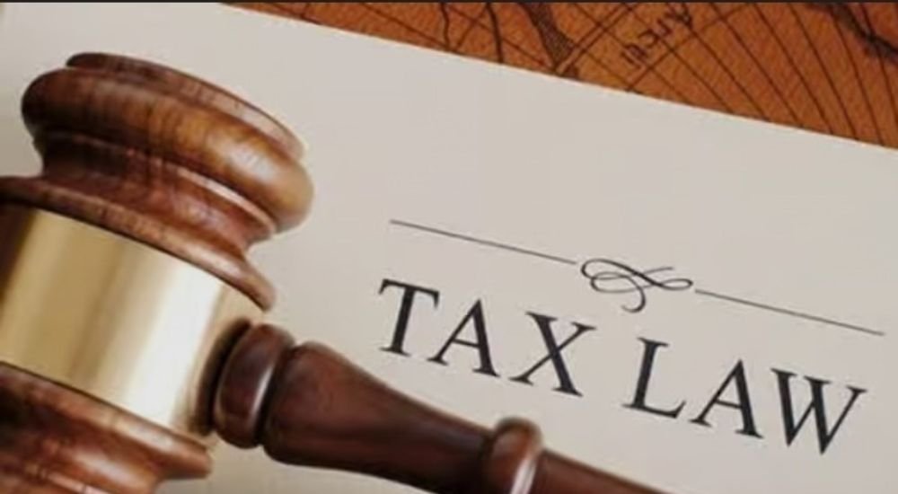 tax law gavel Lawmakers allege post-passage alteration of Tinubu tax laws