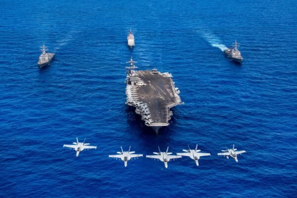 F A 18 Hornets and Super Hornets from Carrier Air Wing CVW Two fly over Nimitz class aircraft carrier USS Carl Vinson CVN 70 Trump calls for $1.5tr defence spending for ‘Dream Military’