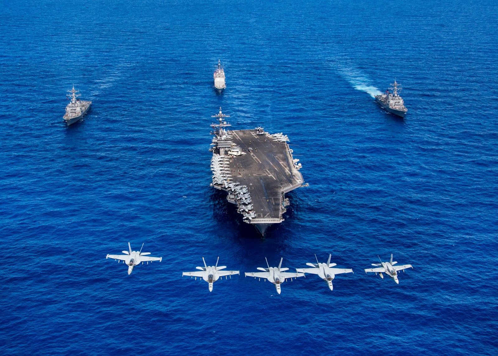 F A 18 Hornets and Super Hornets from Carrier Air Wing CVW Two fly over Nimitz class aircraft carrier USS Carl Vinson CVN 70 Trump calls for $1.5tr defence spending for ‘Dream Military’
