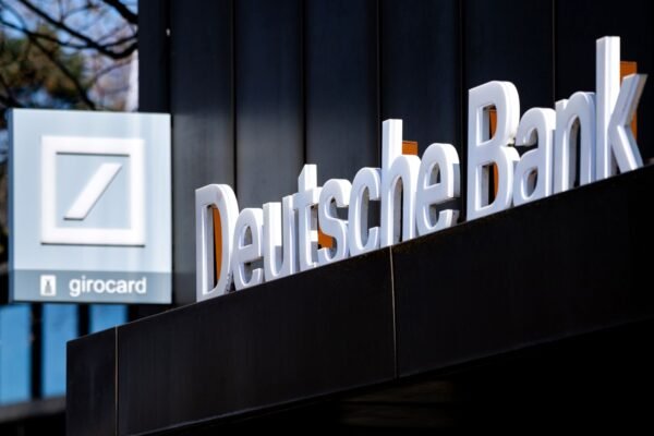 Deutsche Bank logo Deutsche Bank says it will profit from battle for Commerzbank