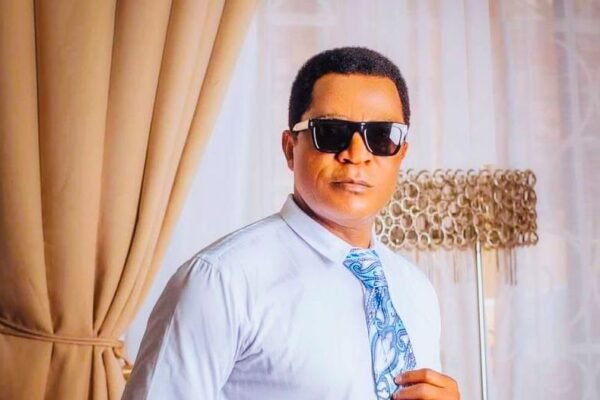 Higgins Peters 3 C'River North traditional rulers smile to the bank as Higgins Peters pays 3-month stipends