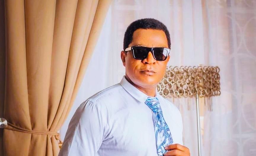 Higgins Peters 3 C'River North traditional rulers smile to the bank as Higgins Peters pays 3-month stipends