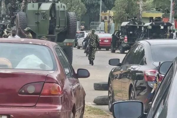 Soldiers at INEC Soldiers and armoured vehicles deployed at INEC, while Jos to get 5,000 security cameras to tackle insecurity — Tinubu