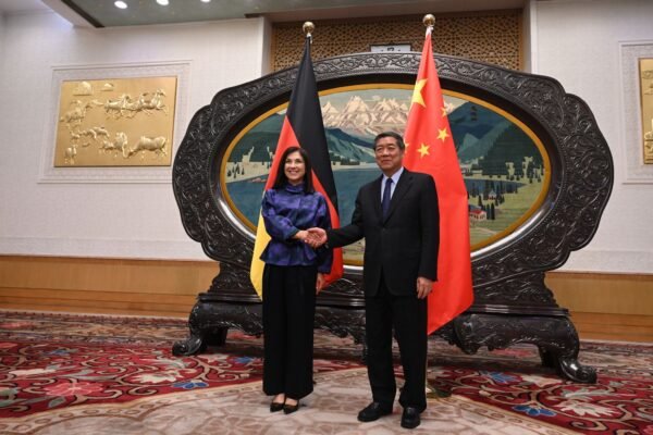 He Lifeng and Katherina Reiche German Economy Minister Pushes China on Competition, Raw Materials