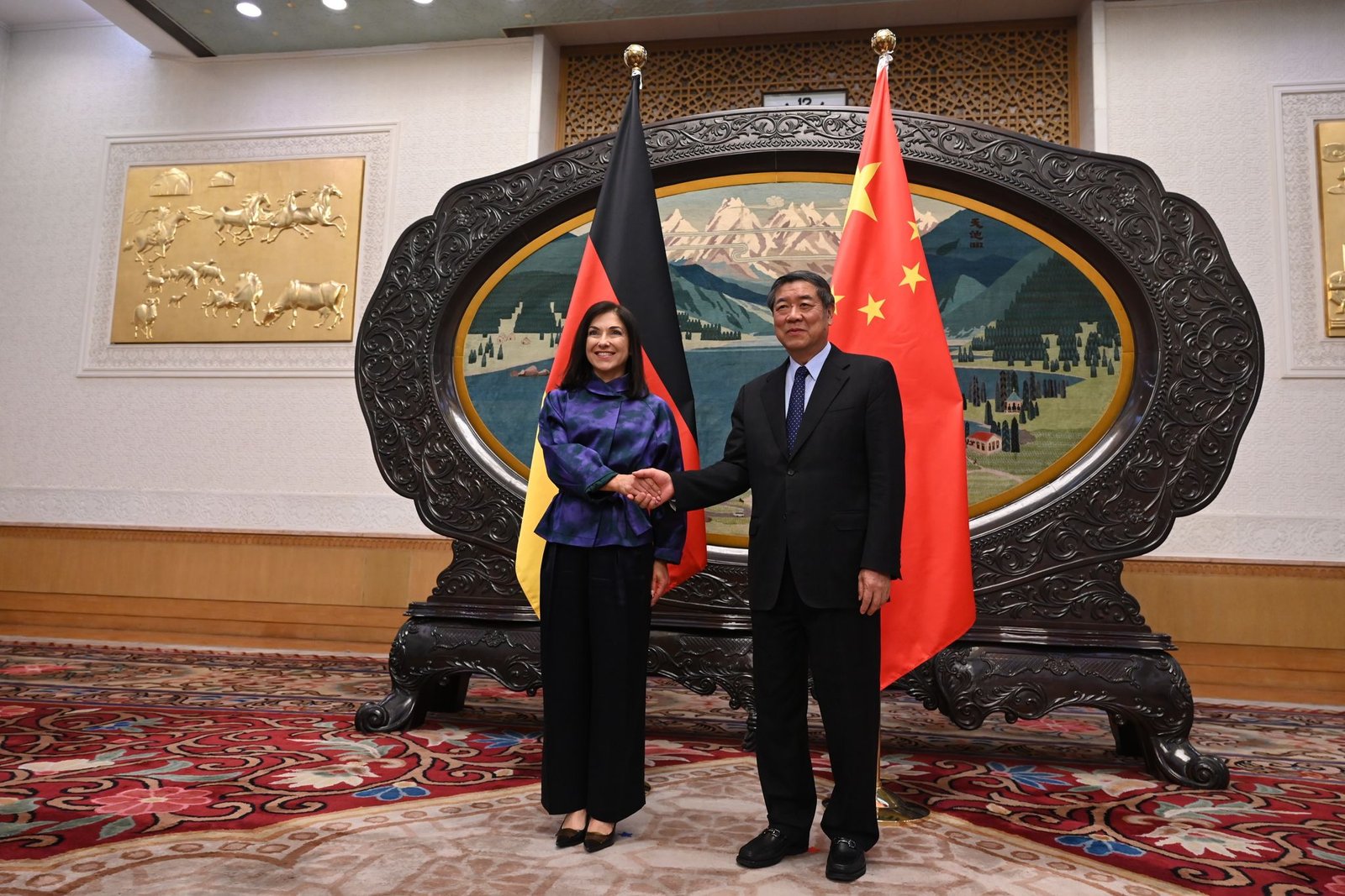 He Lifeng and Katherina Reiche German Economy Minister Pushes China on Competition, Raw Materials