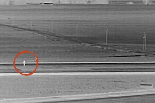 Screenshot 20260512 010843 VIDEO: Moment Individual Walks on Denver Airport Runway and Stands in front of Frontier Airlines jet