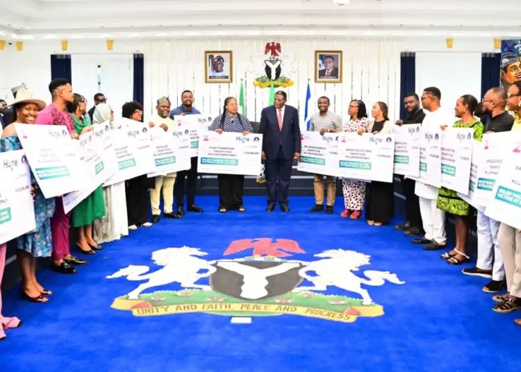 Governor Otu presents ₦450m cheques to 18 SPAR Mall fire victims